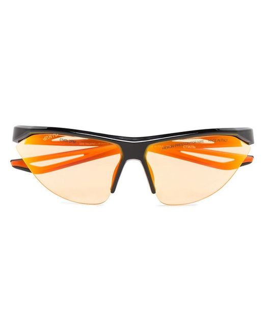 Heron Preston X Nike and orange Tailwind sunglasses