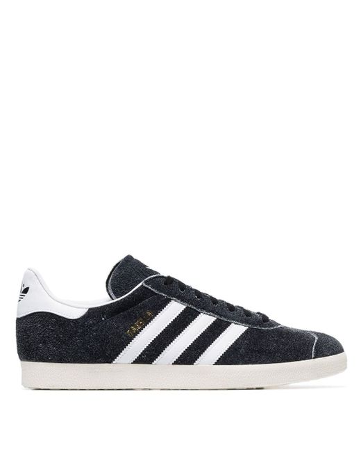Adidas and white Gazelle suede low top sneakers