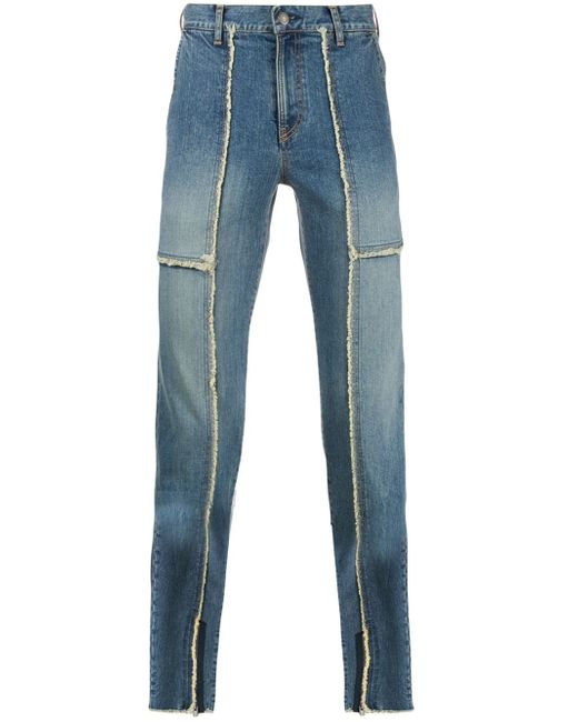 Undercover panelled raw trim skinny jeans Blue