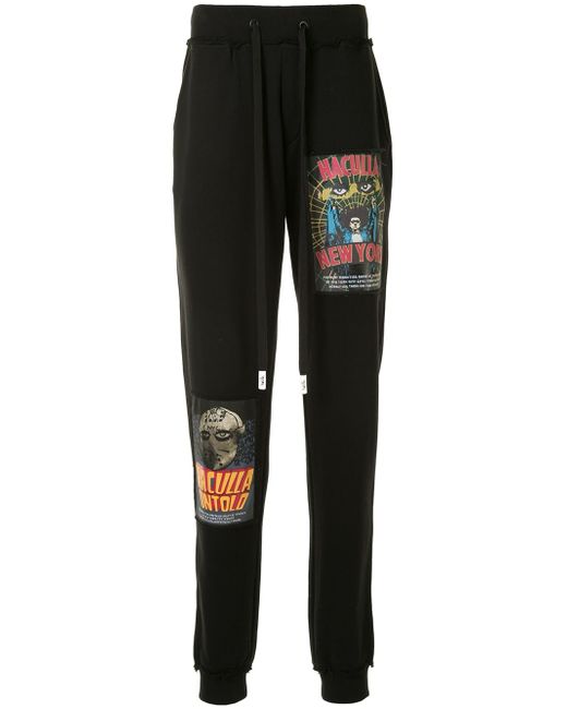 Haculla movie poster print track trousers