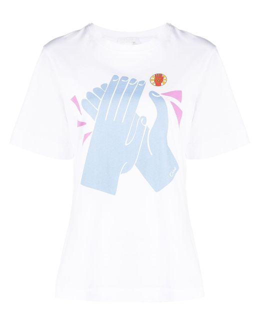 Chloé Clap for her printed T-shirt
