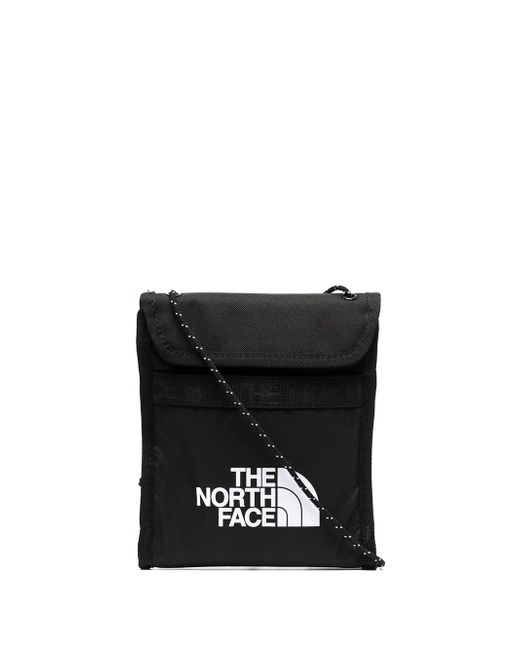 The North Face logo-print messenger bag
