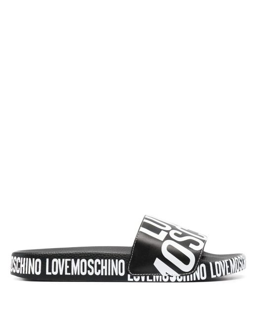 Love Moschino logo-print flat slides