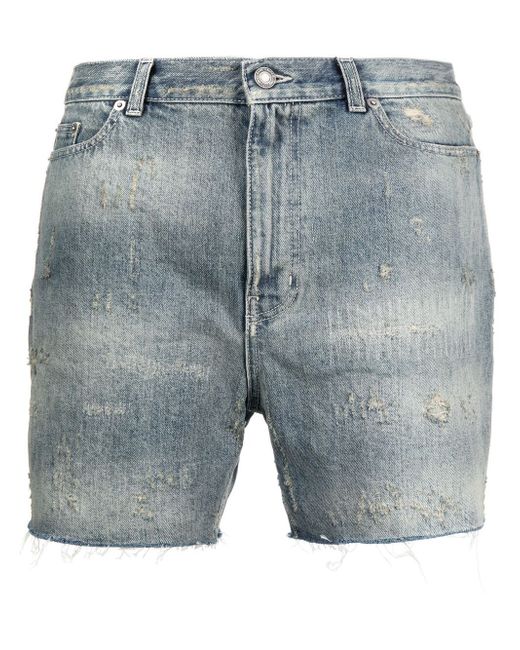 Saint Laurent faded distressed denim shorts