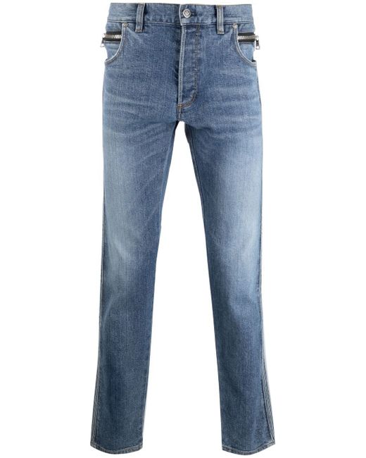 Balmain embossed-logo tapered jeans