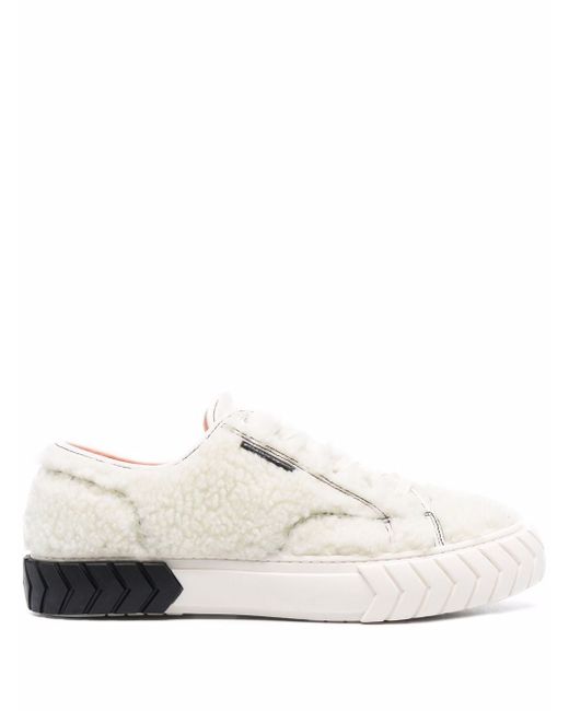 Both faux-shearling low-top sneakers