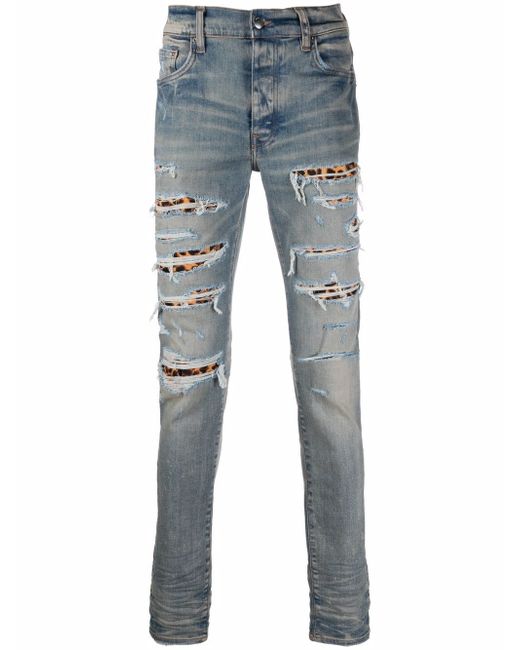 Amiri ripped-detail jeans