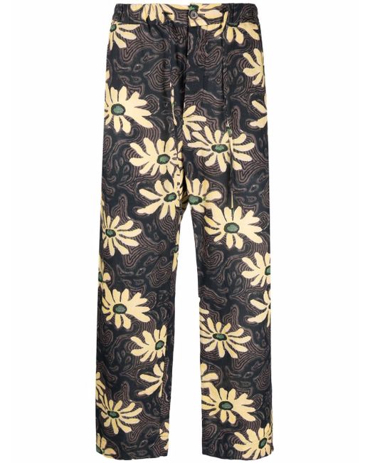 Nanushka all-over floral print trousers