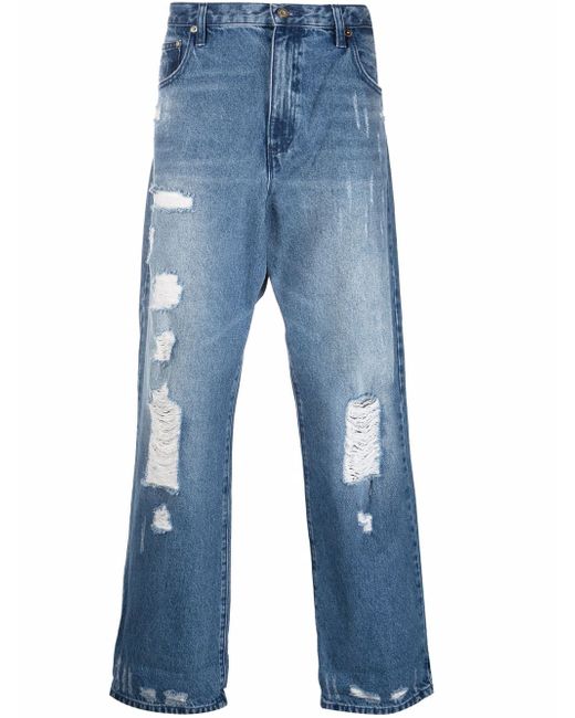 Michael Kors wide-leg distressed jeans