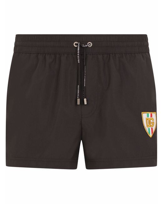 Dolce & Gabbana side-stripe logo swimming shorts