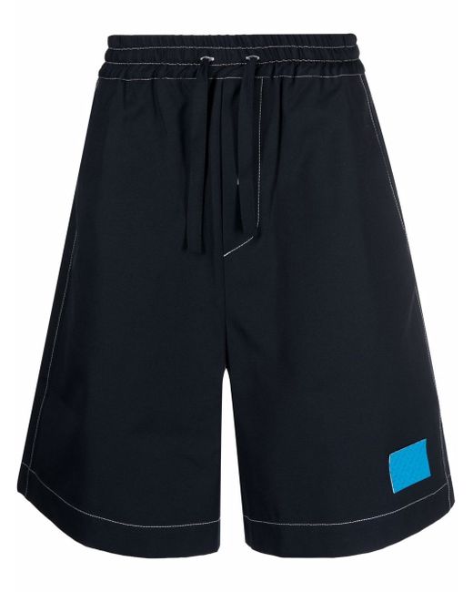 Sunnei dark wash elastic-waist shorts