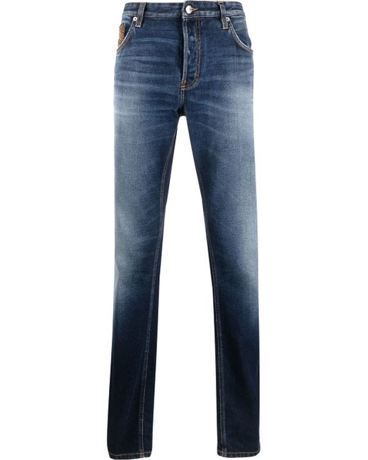 Roberto Cavalli whiskered patch-detail slim jeans