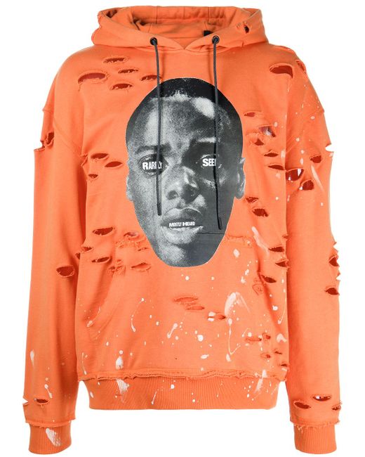 Mostly Heard Rarely Seen Get Out paint-splattered hoodie