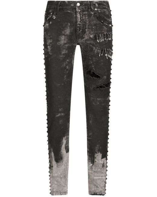 Dolce & Gabbana distressed studded slim-fit jeans