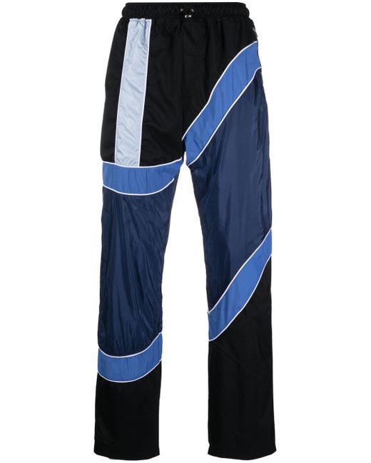 Ahluwalia colour-block stripe-detail trousers