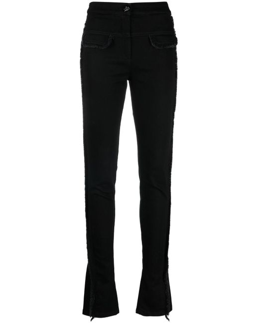 Genny faux-pockets frayed skinny trousers