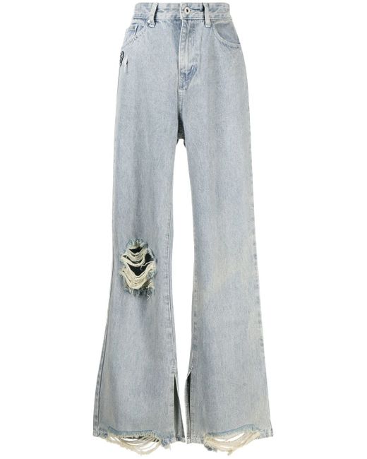 Musium Div. distressed logo-patch flared jeans