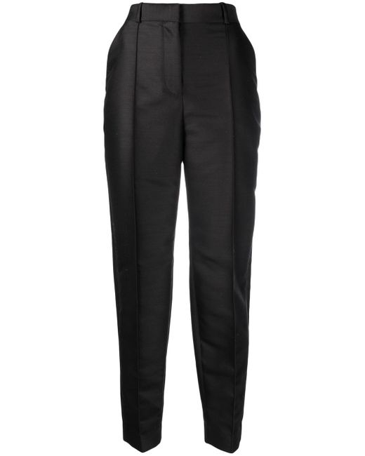 Totême pressed-crease tapered trousers