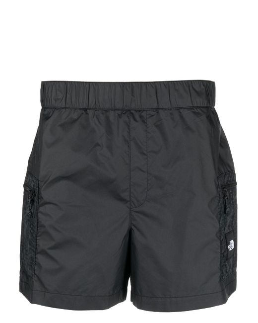 The North Face logo-patch swim shorts