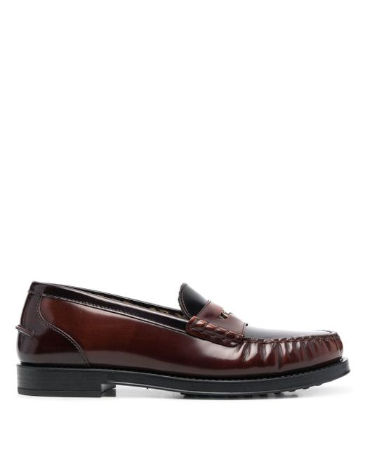 Tod's penny-embellished leather loafers
