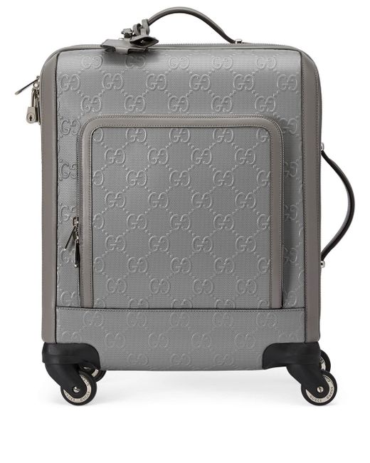 Gucci GG Monogram embossed luggage