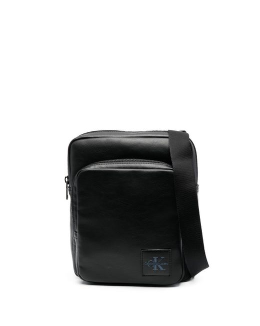 Calvin Klein Jeans logo patch faux-leather messenger bag
