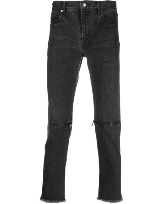 Undercover zip-detail frayed jeans