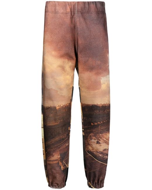 Undercover all-over city print track pants