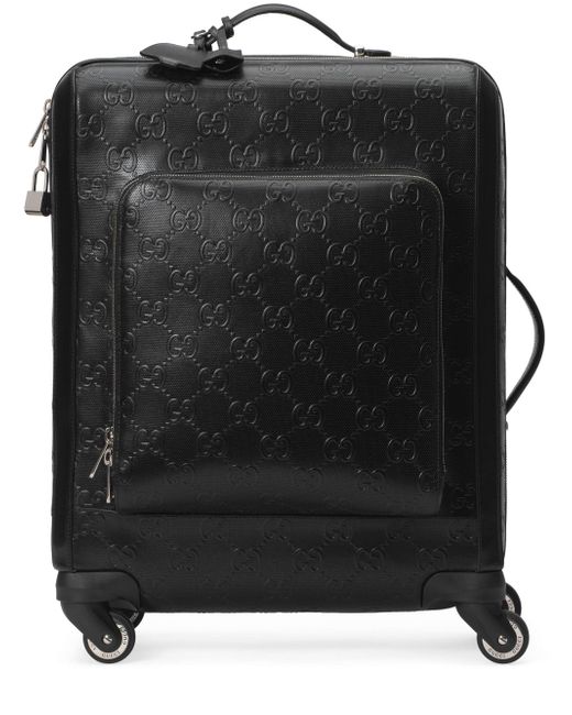 Gucci small GG embossed suitcase