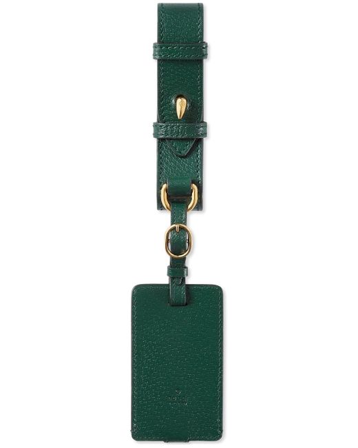 Gucci debossed-logo leather travel tag