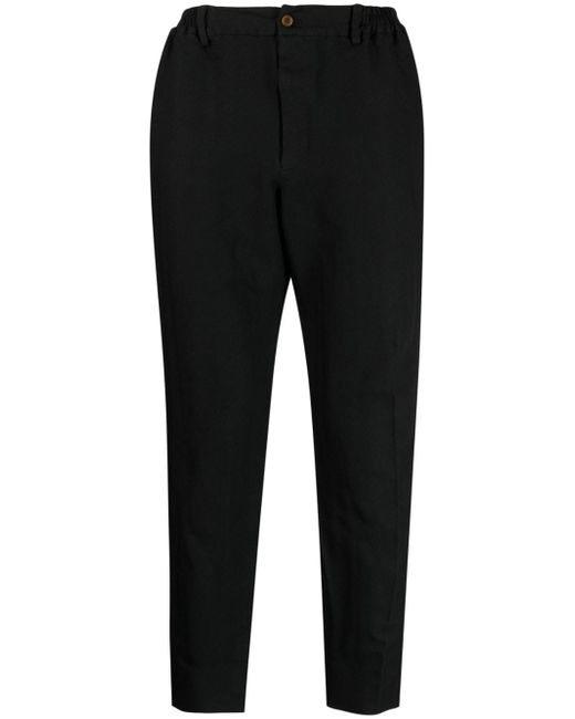 Comme Des Garcons Black chevron-pattern tapered trousers