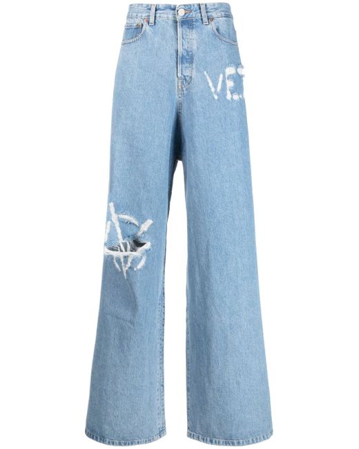 Vetements logo-distressed baggy jeans