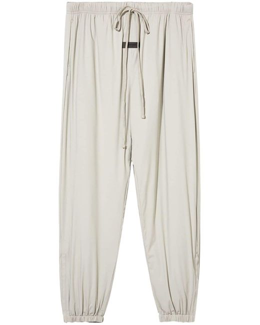 Fear of God ESSENTIALS tapered-leg drop crotch trousers