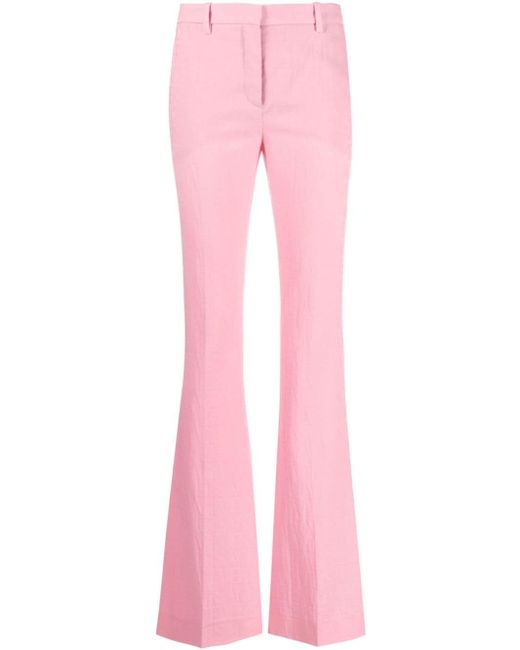 Versace Allover logo flared trousers