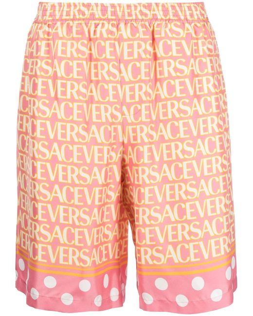 Versace Allover logo-print silk shorts