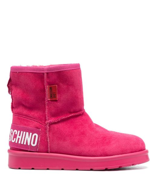 Love Moschino logo-patch exposed-seam ankle boots
