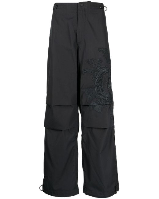 Maharishi graphic-print wide-leg trousers
