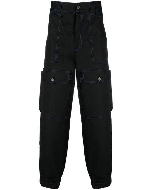 Msgm contrasting-stitch logo-patch trousers