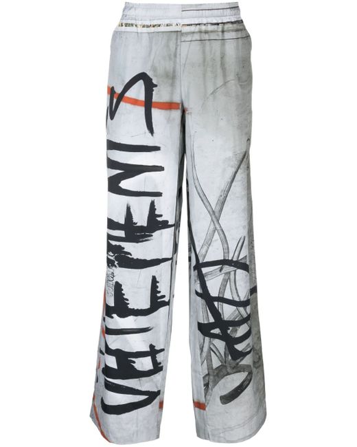 Vetements Graffiti logo-print track pants