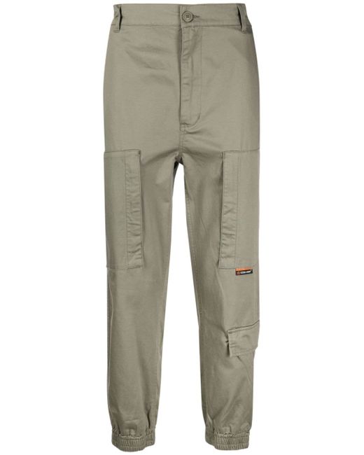 Izzue logo-patch tapered trousers