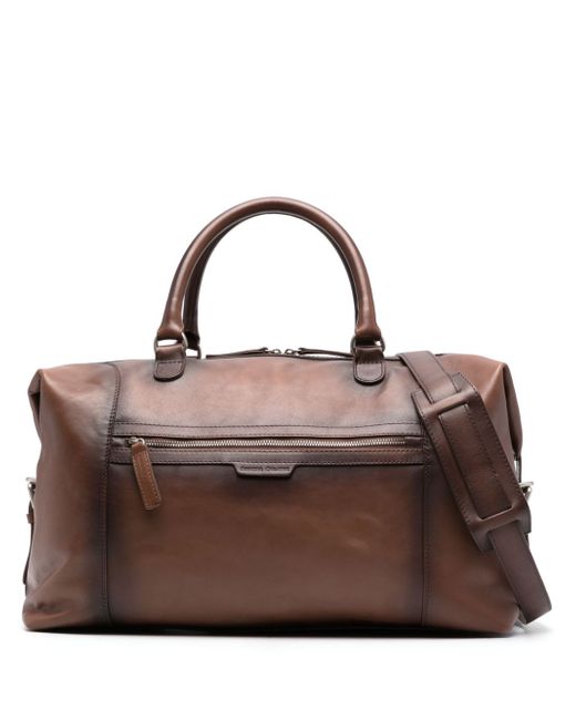 Officine Creative logo-engraved distressed leather holdall