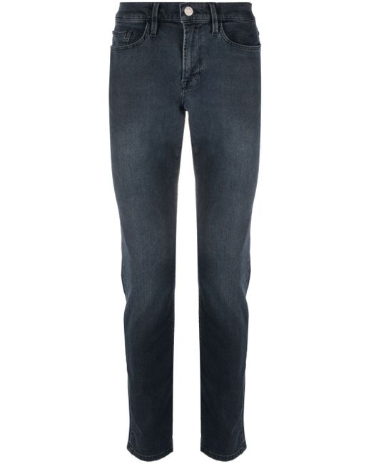 Frame mid-rise tapered jeans