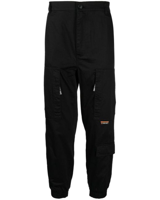 Izzue tapered-leg trousers