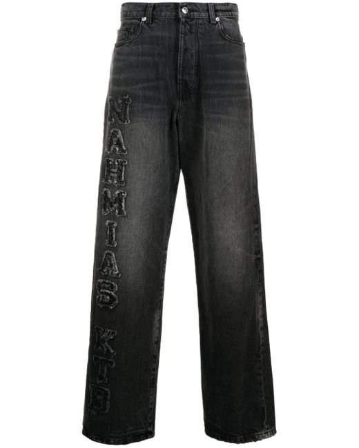 Nahmias logo-patch wide-leg jeans