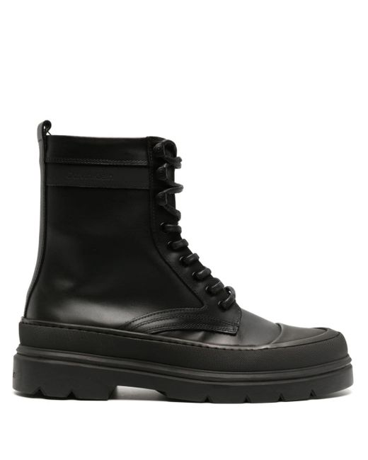 Calvin Klein logo-debossed leather ankle boots