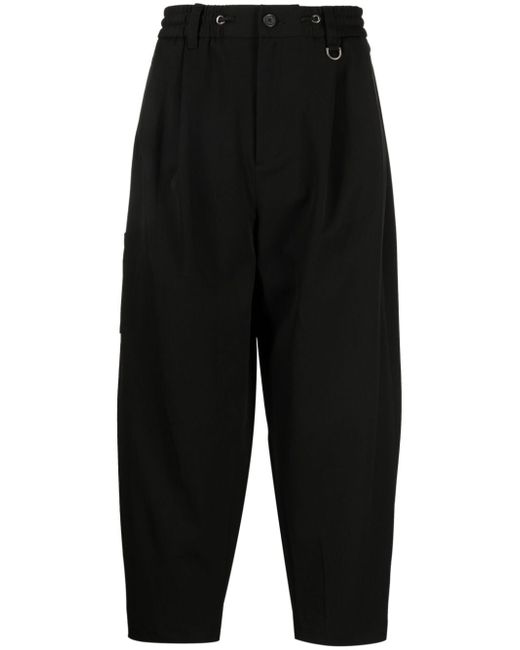 Songzio logo-embroidered pleated drop-crotch trousers