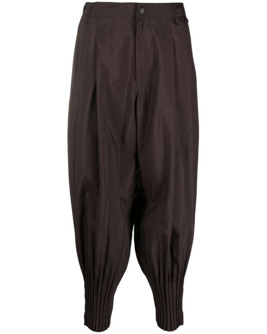 Homme Pliss Issey Miyake Cascade tapered ripstop trousers