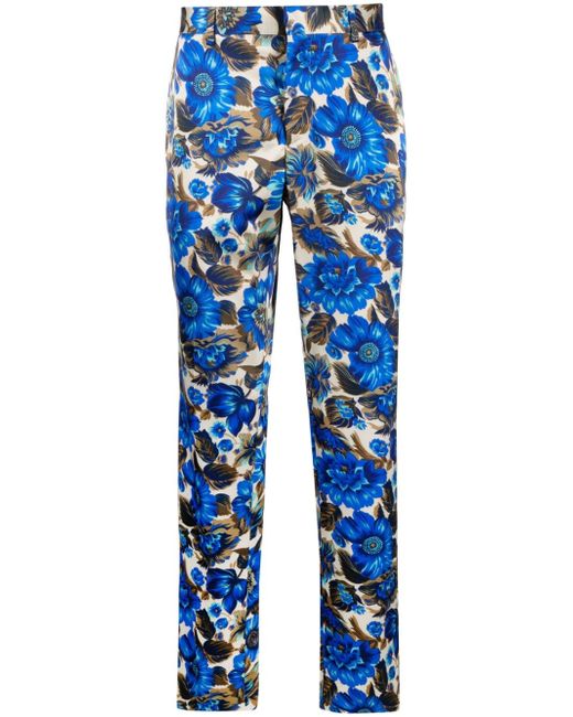 Moschino all-over floral printed tailored trousers