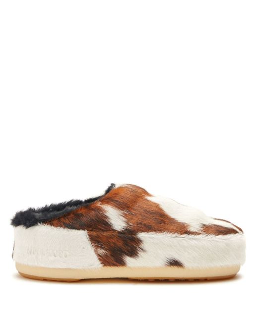 Moon Boot cow-print pony hair mules