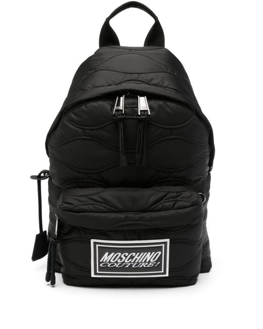 Moschino logo-patch quilted backpack